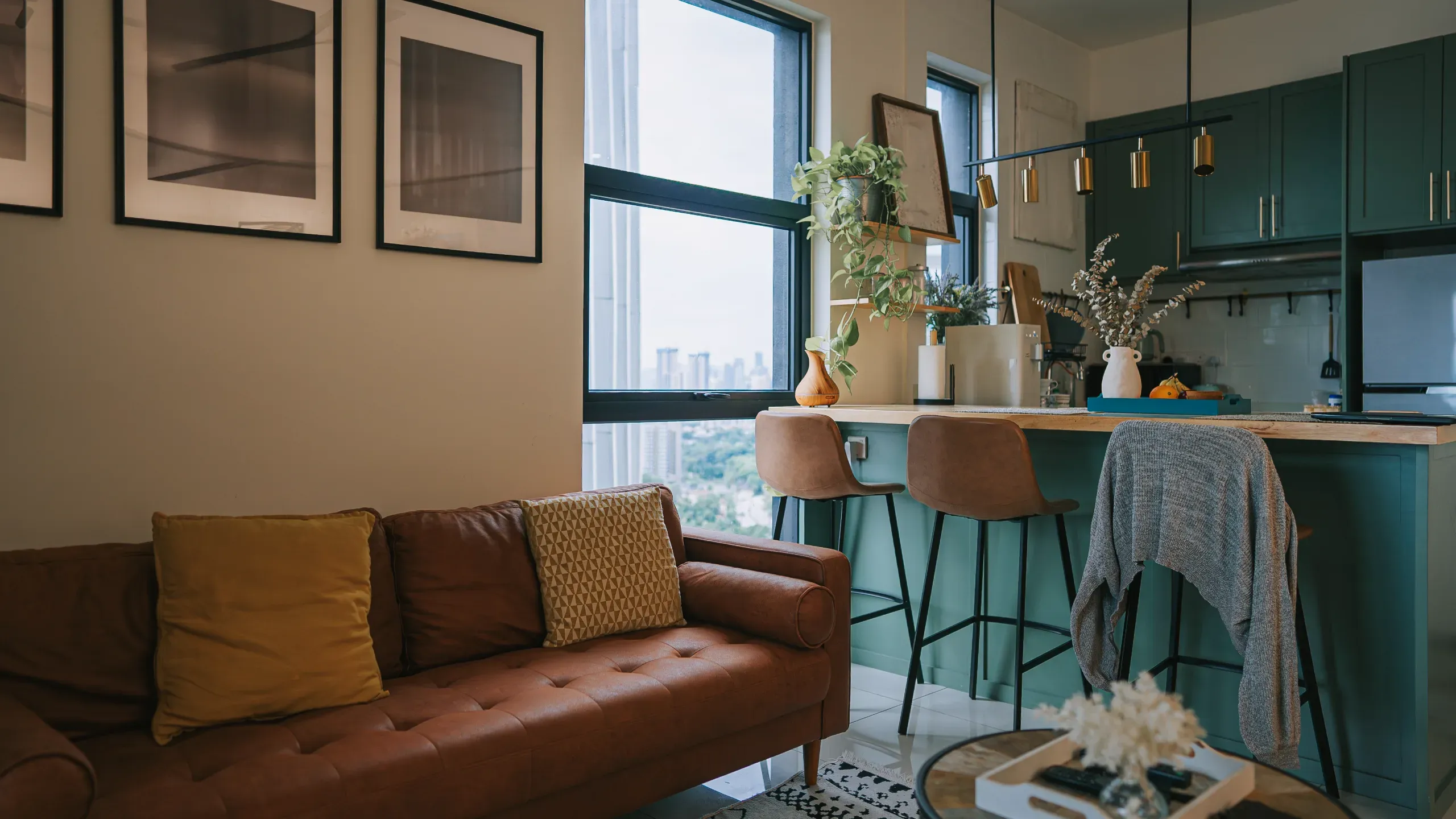 cozy studio apartment with sofa and kitchen island