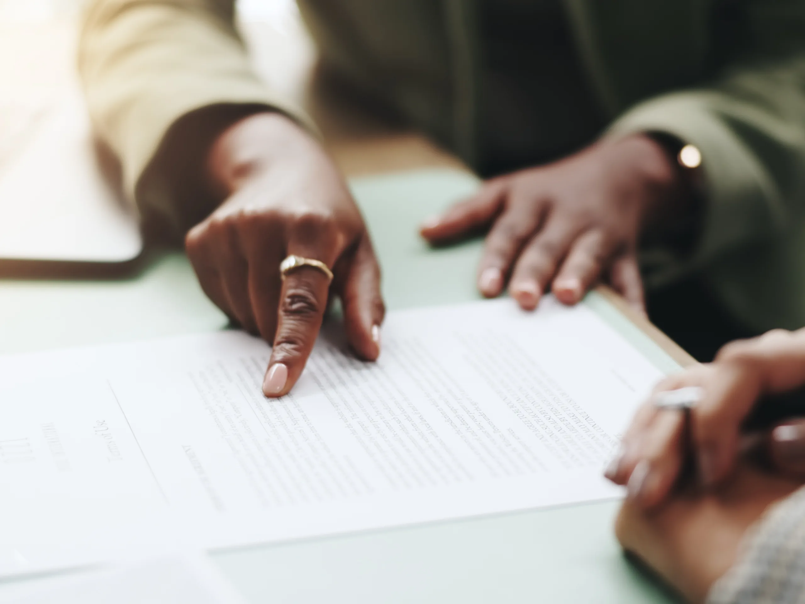 Business contract document displayed on a desk, representing a formal commercial agreement.