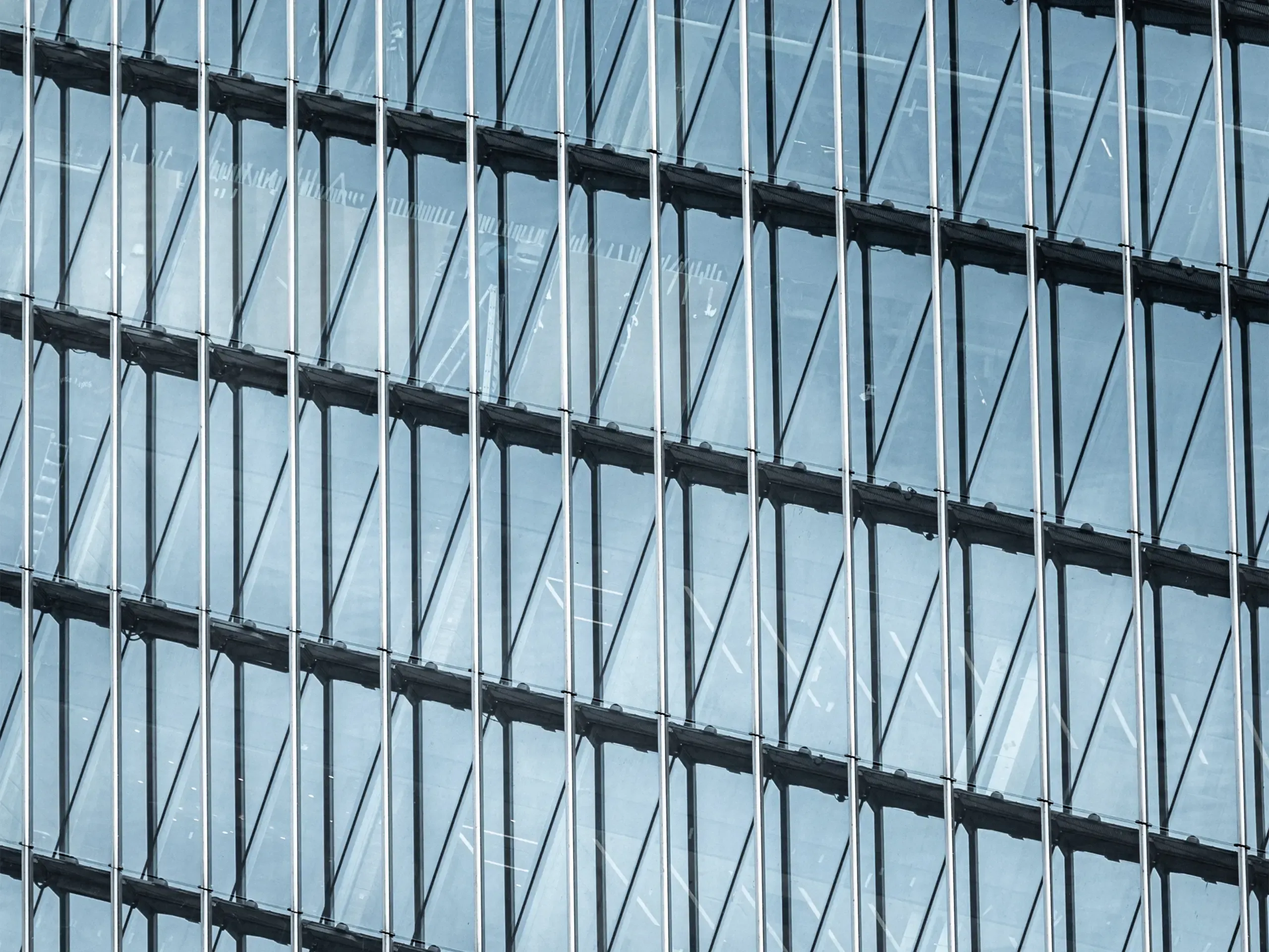 modern office exterior facades with clouds reflections
